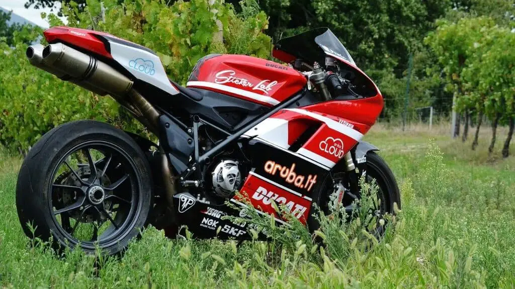 red and black sports bike with fairings, motorcycle fairings
