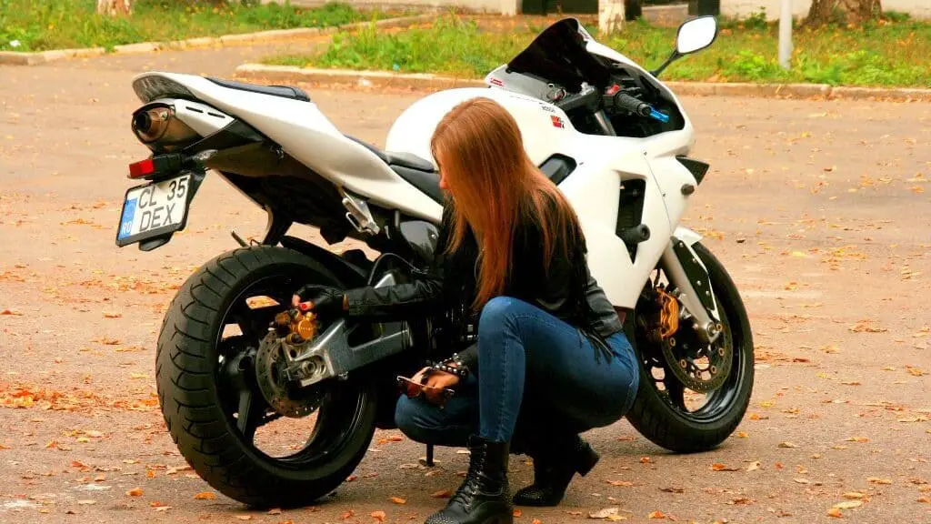 Girl with Large Powerful Sports Bike