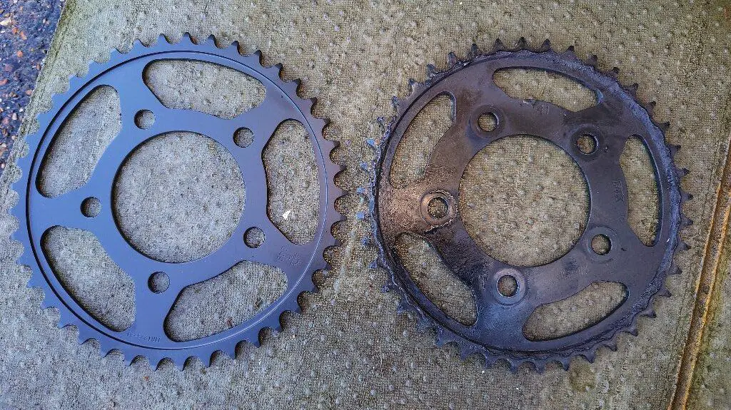 comparing new and old motorcycle rear sprocket