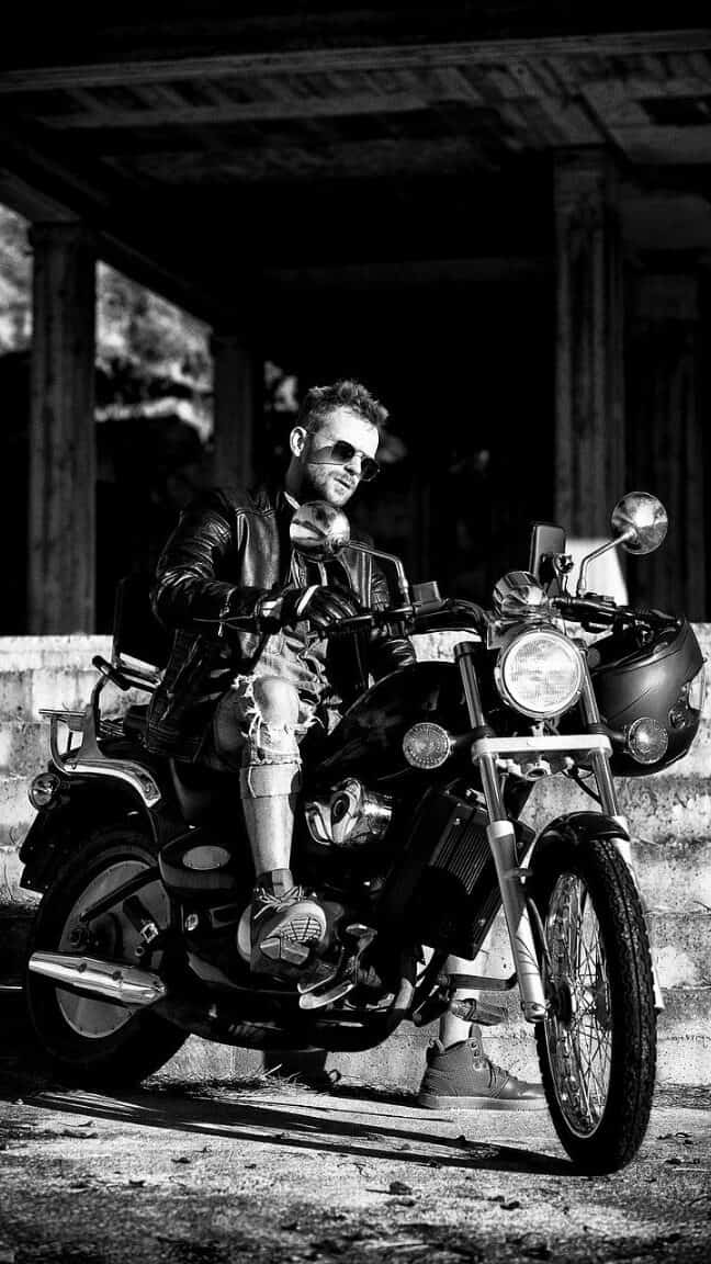 Cool biker sitting on a cool motorcycle