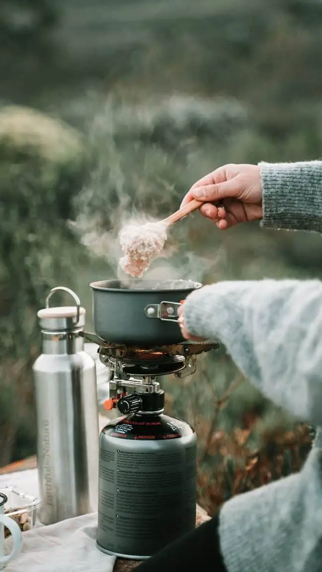 Cooking on portable camping stove